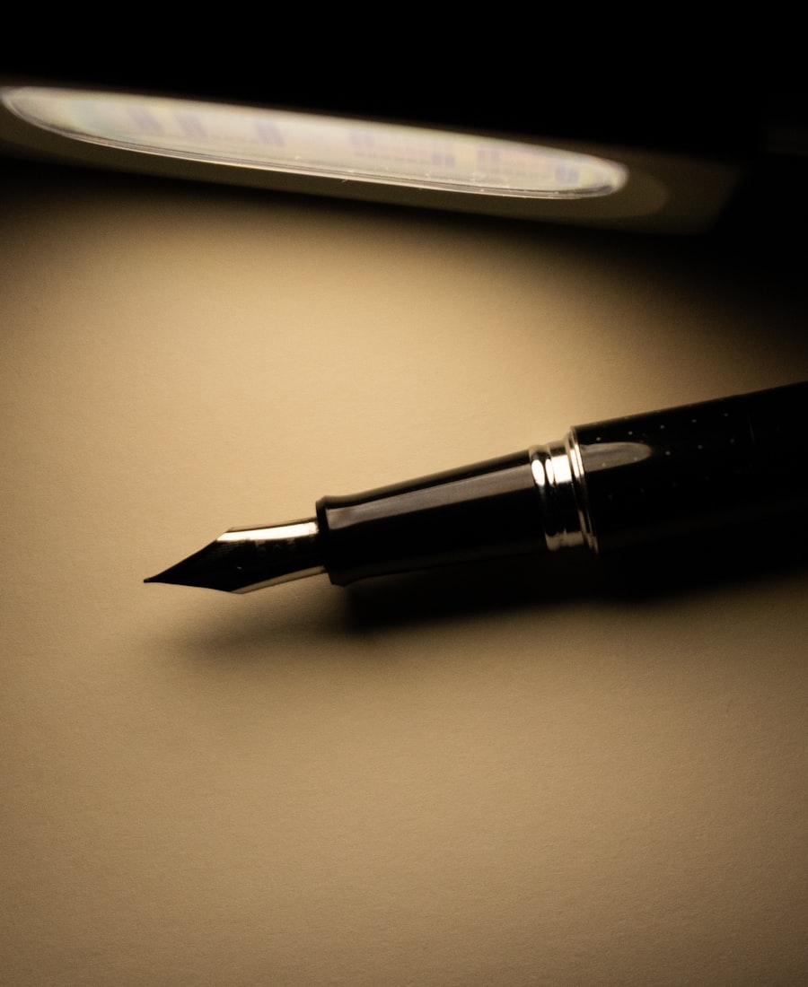 A fountain pen on paper under warm lamplight